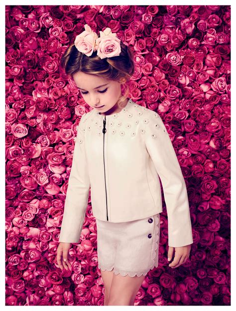 newborn dior clothes.